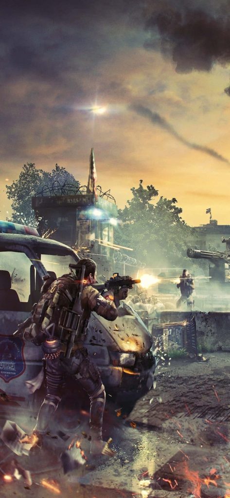 Tactical agent in intense Tom Clancys The Division 2 shootout behind D.C. police car sunset Wallpaper