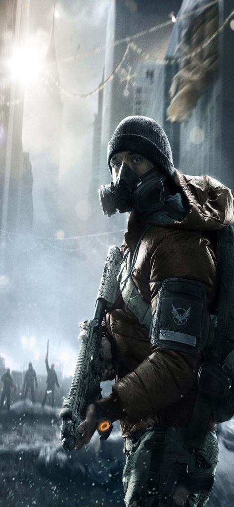 Tom Clancy’s The Division agent in gas mask with rifle in snowy post-apocalyptic cityscape wallpaper