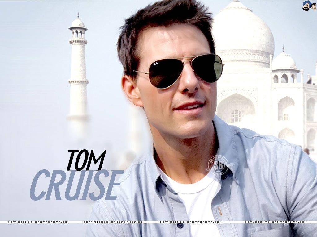 Tom Cruise wearing aviator sunglasses with Taj Mahal background high quality portrait wallpaper