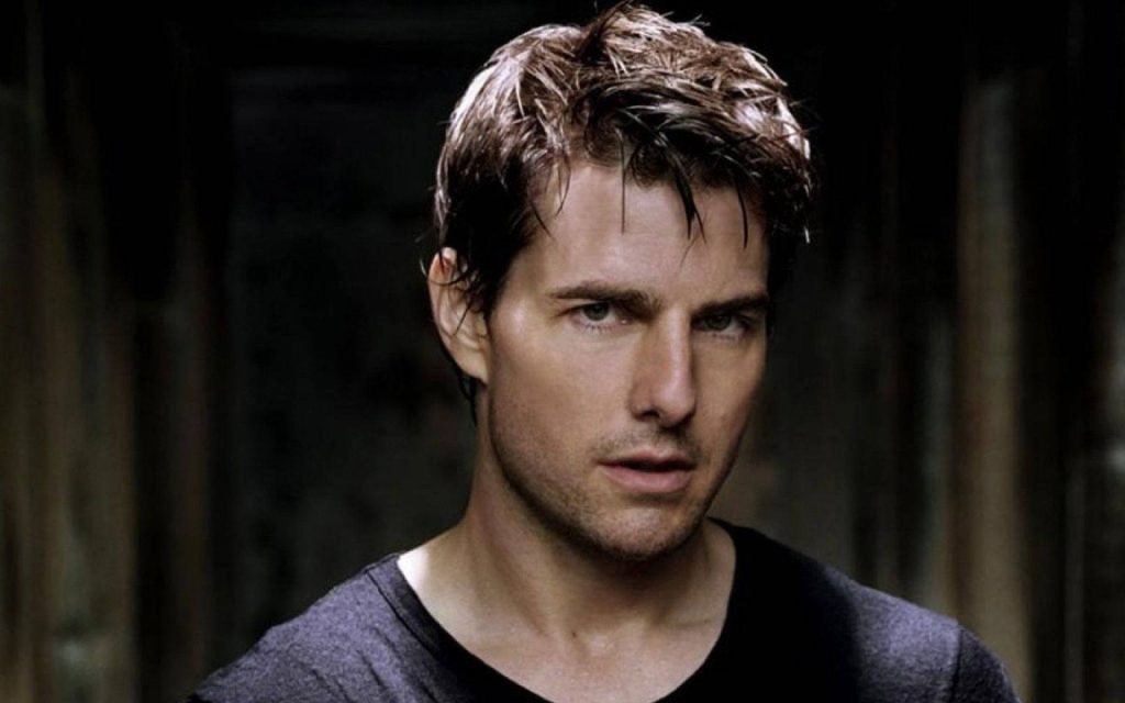 Tom Cruise intense portrait wallpaper dark moody lighting wet hair black shirt desktop background