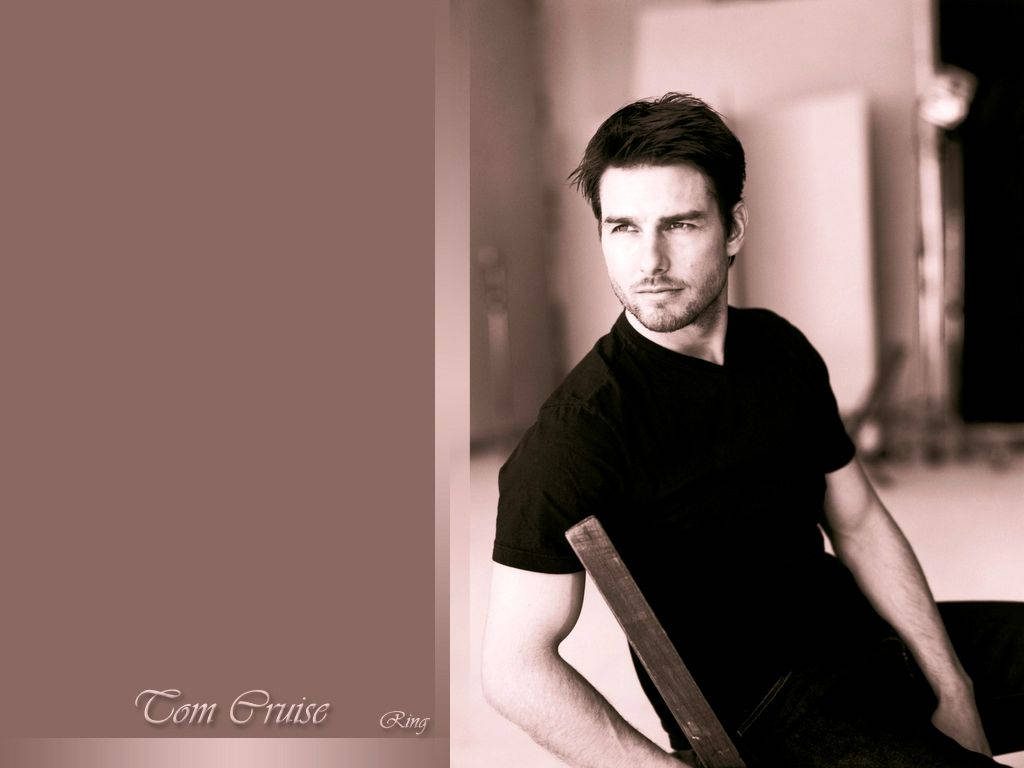 Tom Cruise sepia portrait wallpaper seated relaxed cinematic lighting stylish Hollywood icon