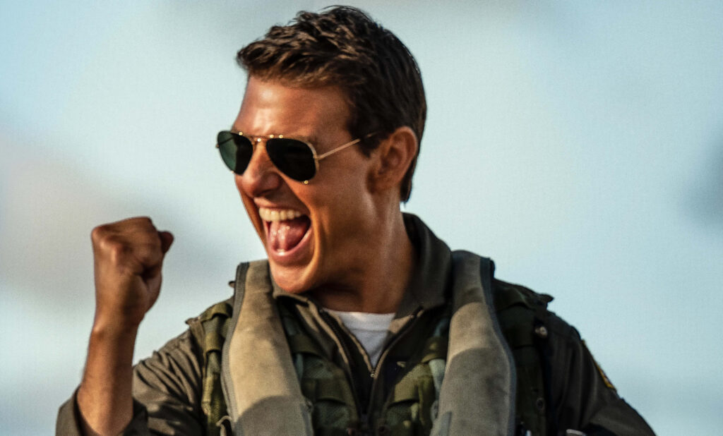 Tom Cruise as Pete Mitchell excited intense expression Top Gun Maverick wallpaper background