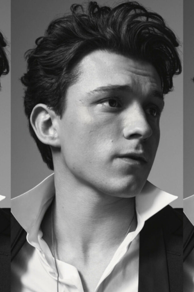 Greyscale portrait of Tom Holland classic pose stylish sharp modern look wallpaper background