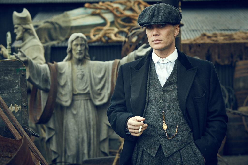Dapper and Dangerous: Tommy Shelby Steals the Show in this Stylish Peaky Blinders Wallpaper