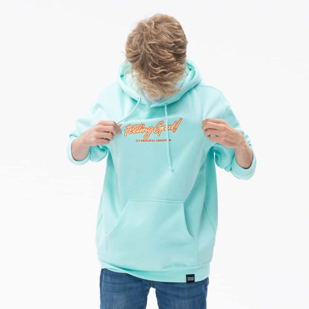 TommyInnit wallpaper mint green hoodie orange Feeling Good text white background desktop art