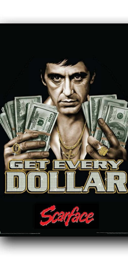 Tony Montana holding cash with intense look Scarface gritty ambitious wallpaper background