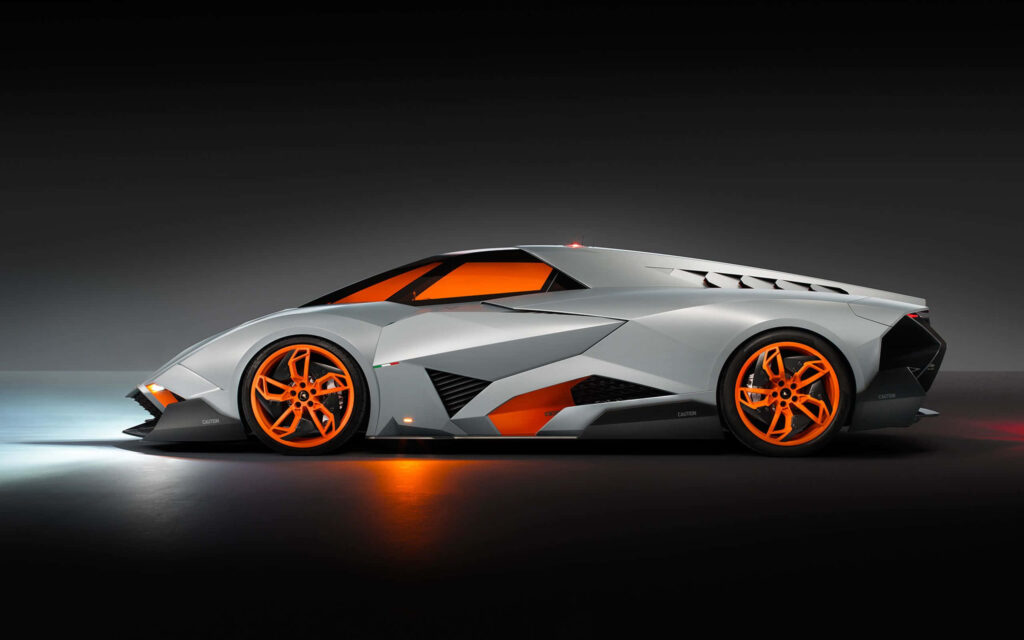 Exquisite Futuristic Automotive Showcase: Captivating Lamborghini Egoista Radiates White and Orange Hues on Sleek Black Canvas - Top 10 Car Exposition Wallpaper