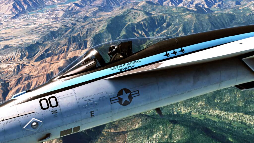 Tom Cruise as Maverick flying high above mountains in Top Gun Maverick flight simulator wallpaper