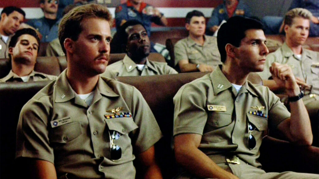 Tom Cruise as Pete Mitchell and Anthony Edwards in pilot uniforms Top Gun Maverick wallpaper