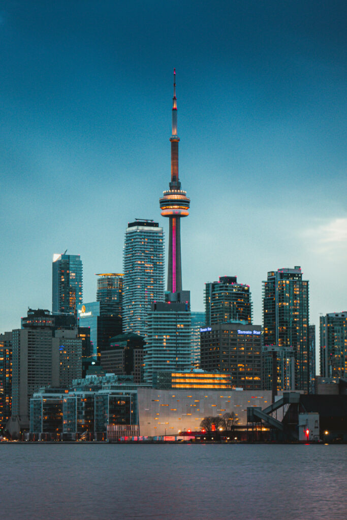 Toronto Cityscape Wallpaper: CN Tower at Dusk with Waterfront Reflections