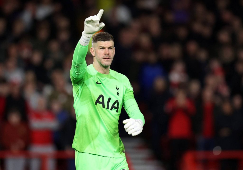 Tottenham Hotspur goalkeeper Fraser Forster in neon green kit signals during match wallpaper