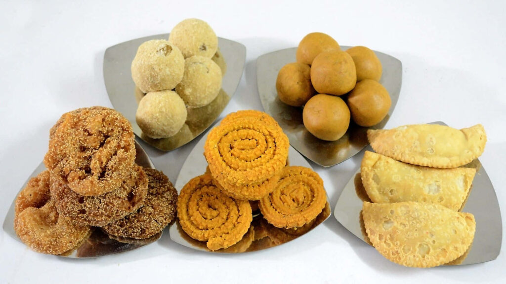 Delightful Indian Sweets & Snacks: Laddoos, Gujiyas, Chaklis Wallpaper