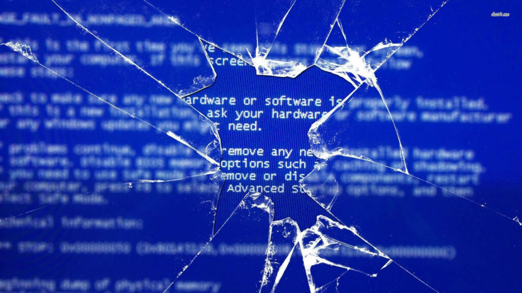 Shattered Blues: A Cracked Computer Screen BSOD Wallpaper Tale