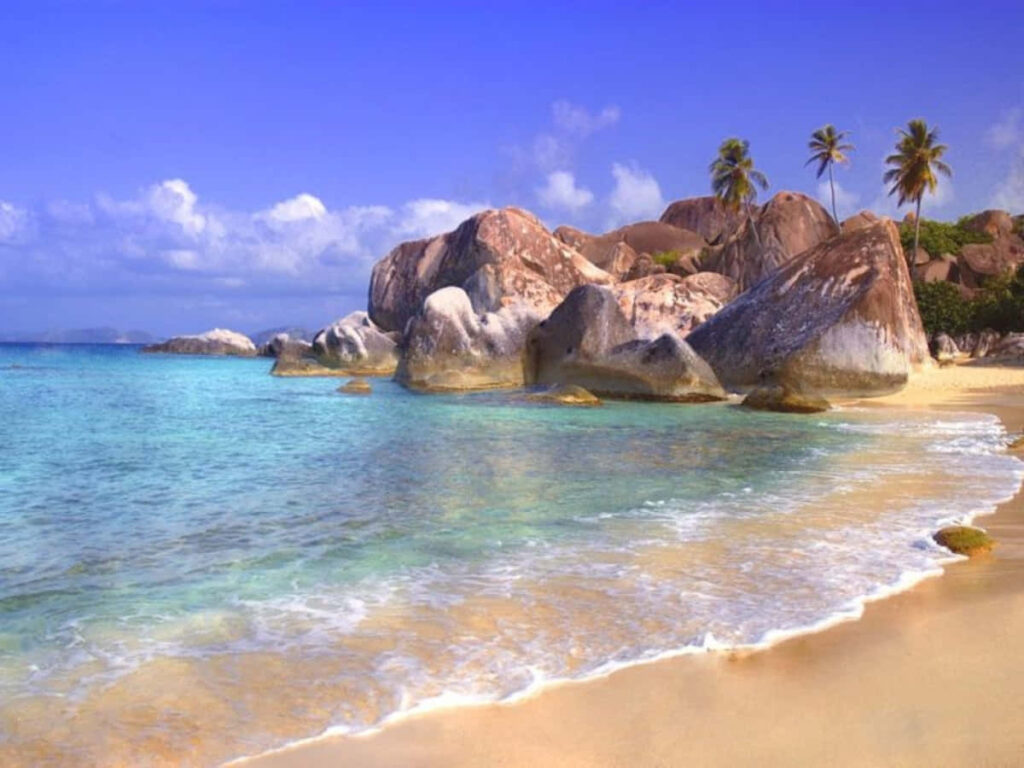 Tranquil Beach Scene Wallpaper: Turquoise Waters & Sandy Shore