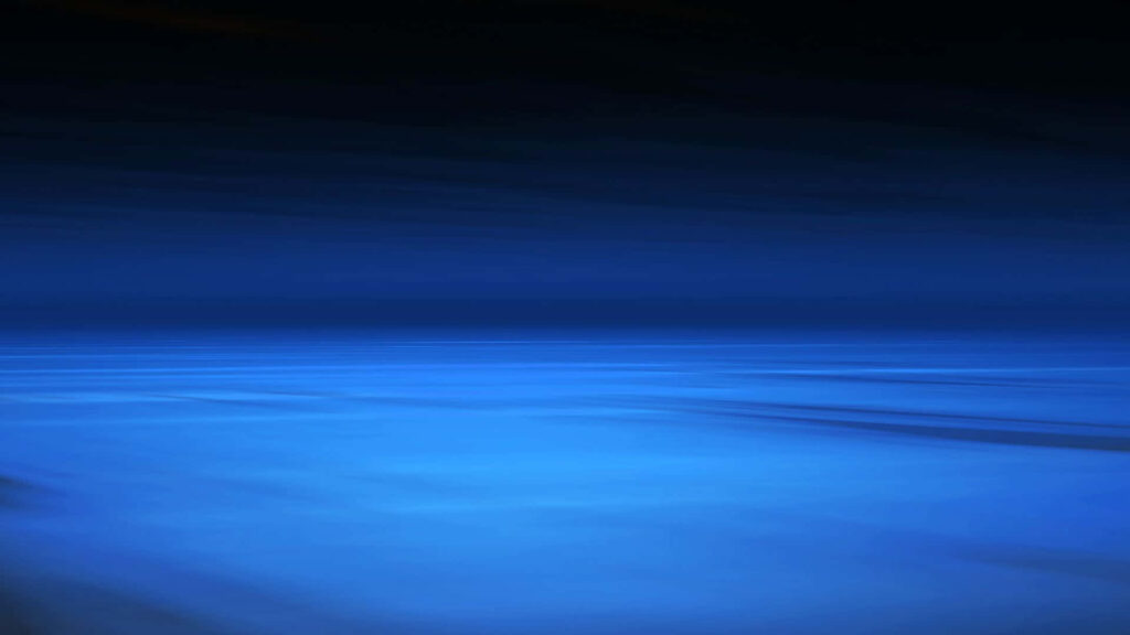 Tranquil blue-toned space wallpaper with serene depth for immersive backgrounds.