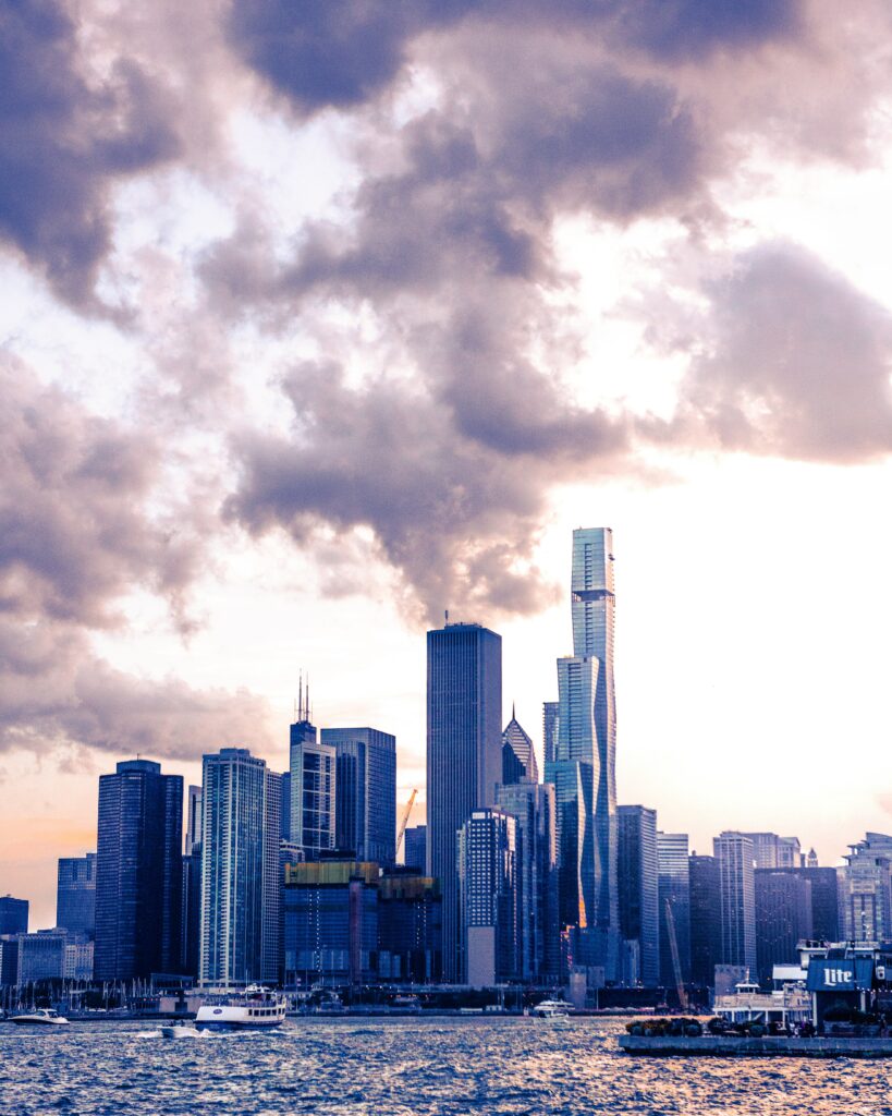 Stunning Cityscape Wallpaper: Modern Skyscrapers & Tranquil Water