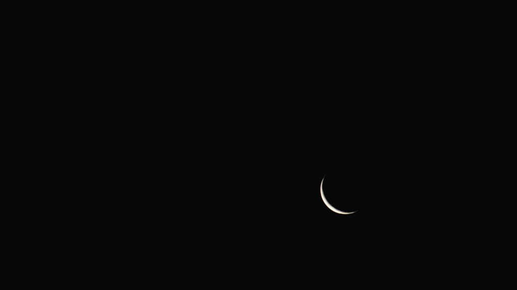 Serene Minimalist Night Sky Wallpaper with Crescent Moon Background