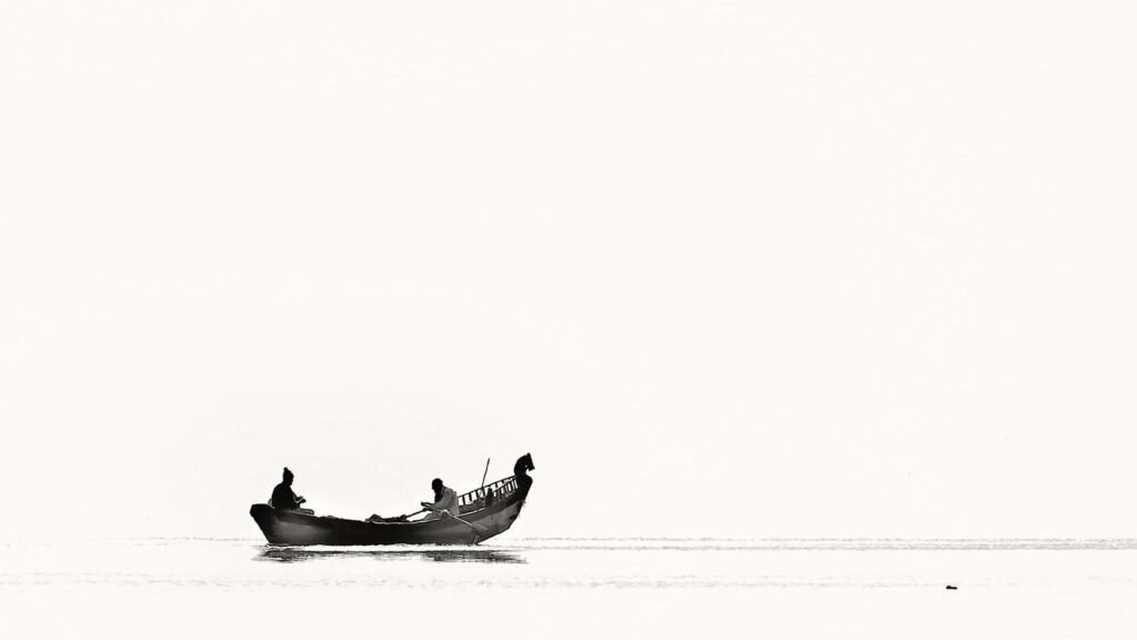 Minimalist White Wallpaper: Tranquil Boat Scene on Calm Water