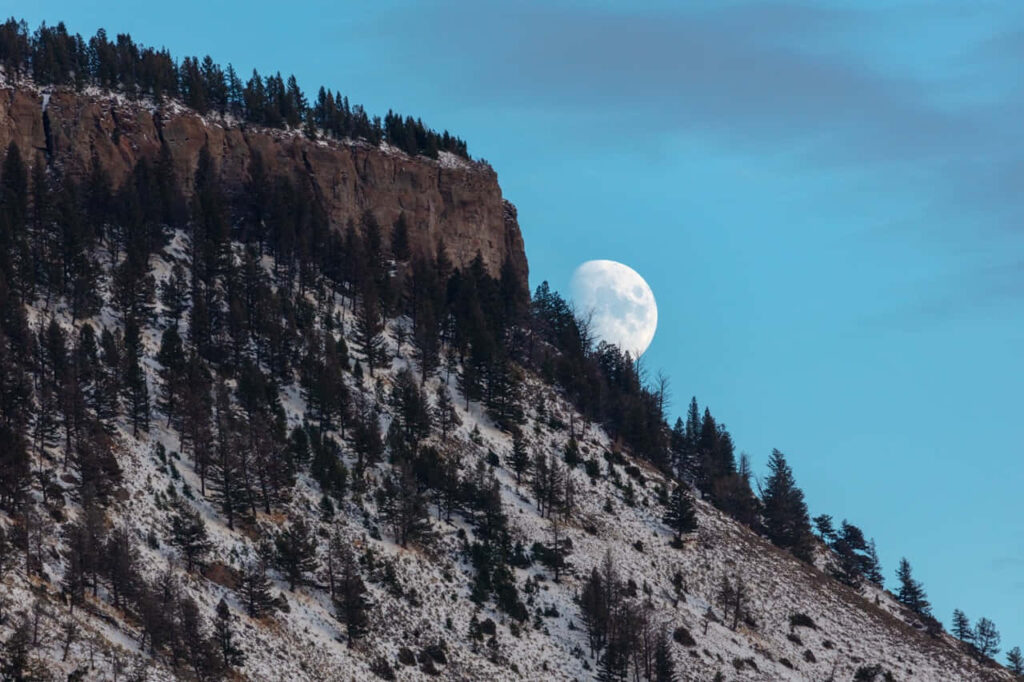 Glowing Moonset Over Snowy Mountains - Tranquil Wallpaper Background
