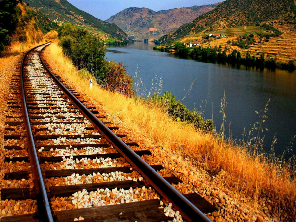 Tranquil Railway Track & River Wallpaper - Serene Nature Background