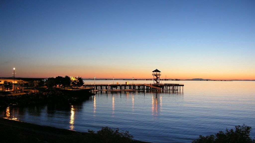 Tranquil Pier Sunset Wallpaper - Serene Sea & Evening Sky
