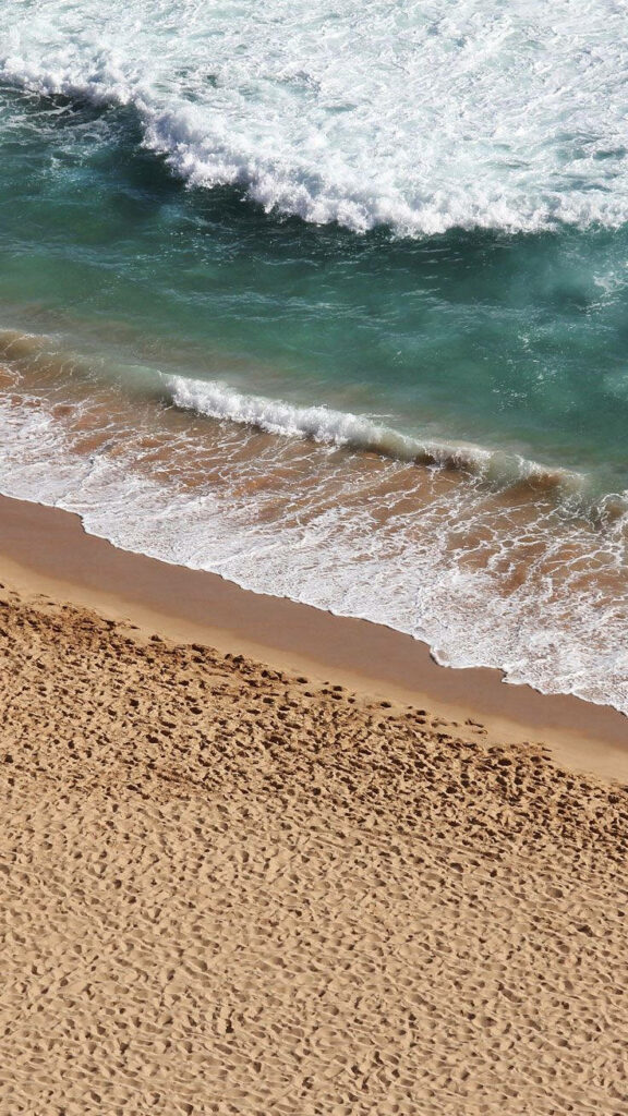 Blissful Coastal Escape: Embrace Serenity with this Oceanic Wallpaper for your iPhone
