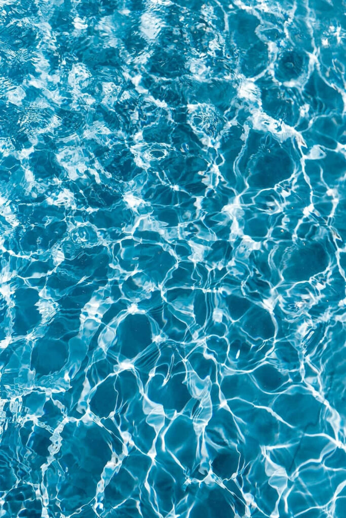 Mesmerizing Water Patterns Wallpaper: Soothing Blue Background Design