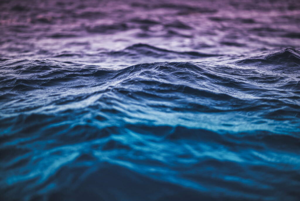 Ethereal Ocean Symphony: Captivating 5K Wallpaper Immersed in Waves and Ripples
