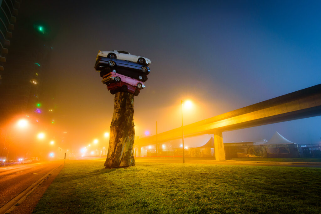 Trans Am Totem: Urban Art Installation in Vancouver's Foggy Night Wallpaper