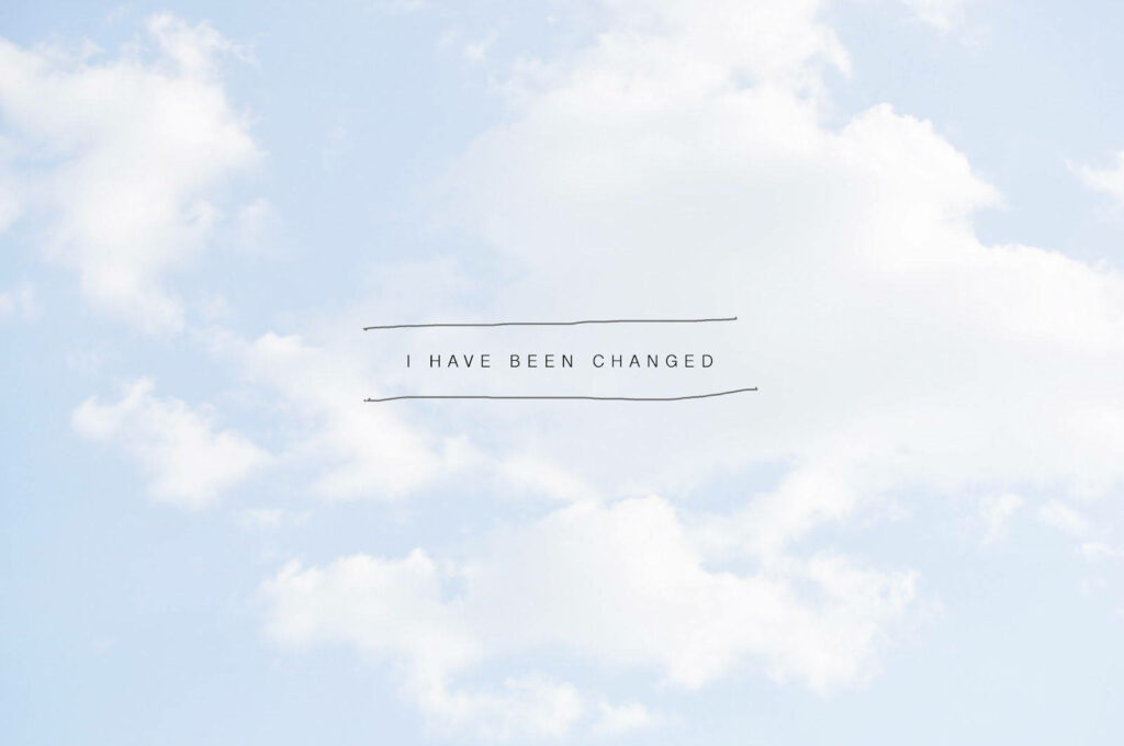 The Serene Transformation: Embracing Change in a Pastel Blue Dreamscape Wallpaper