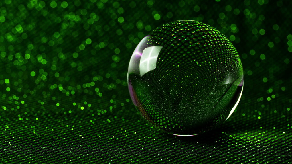 Vibrant Green Glass Orb: Captivating Abstract 4K Wallpaper