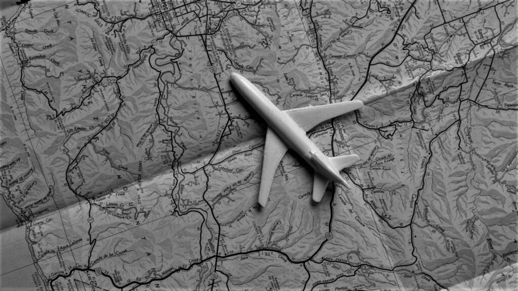 Cool Black & White Travel Wallpaper: Map & Model Airplane Design