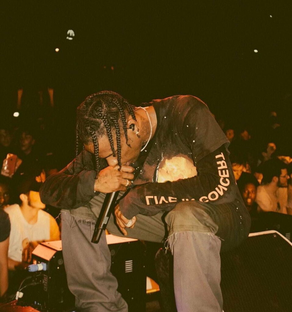 Vintage HD Phone Wallpaper: Capturing Travis Scott's Aesthetic in Concert