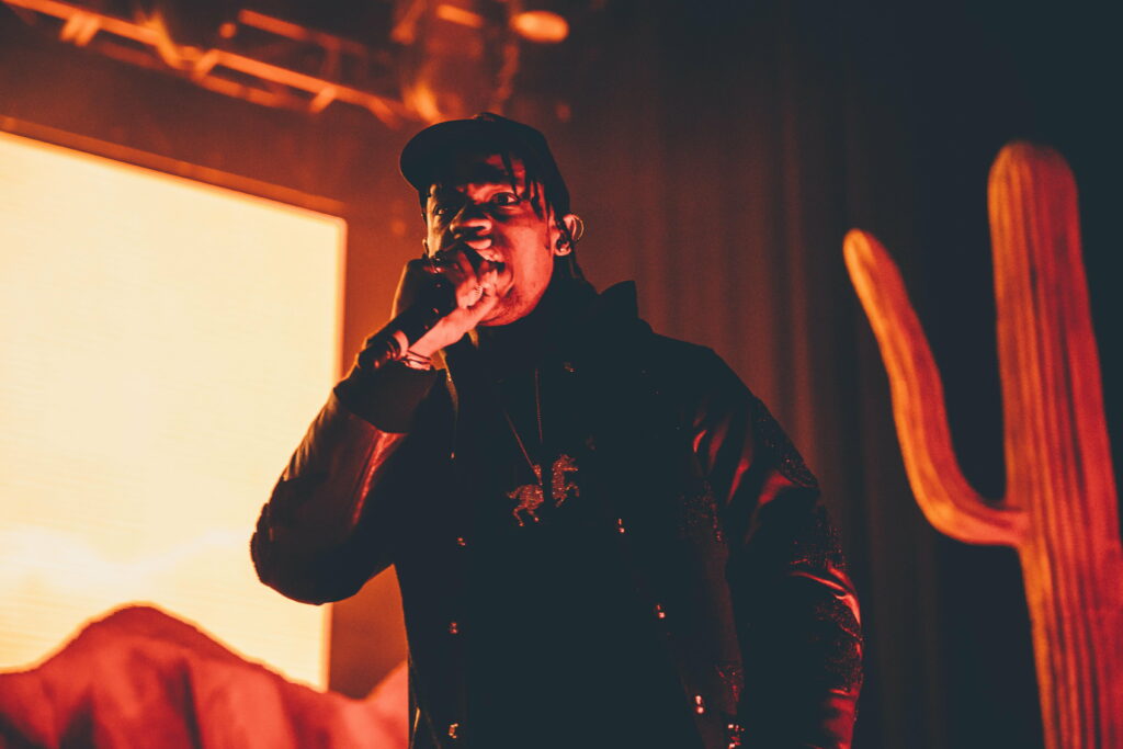 The Rhythmic Vibes of Travis Scott: An Aesthetic 5K Wallpaper for your Laptop