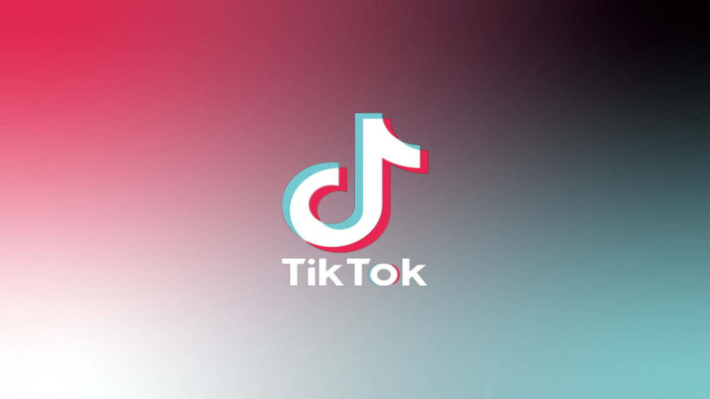 Tri-colored TikTok Logo Shines on Abstract Gradient Background Wallpaper