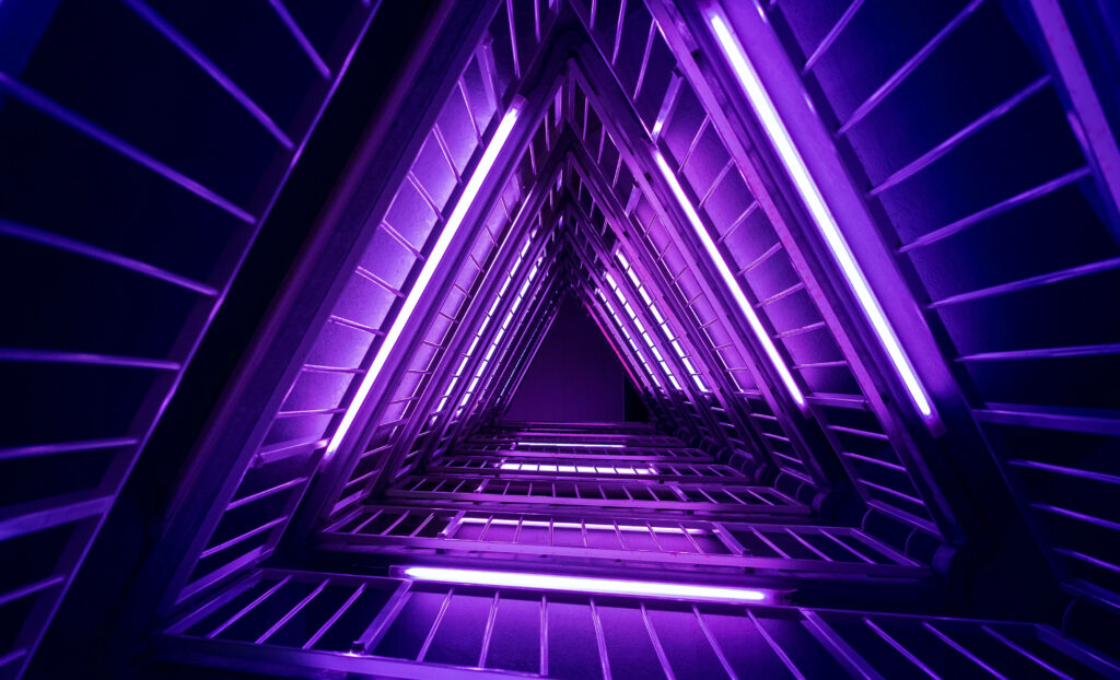 Luminous Pathway: Exploring a Radiant Neon Purple Atmosphere Wallpaper