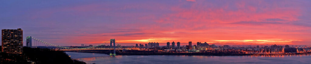 Immerse in Dual Serenity: Triple Monitor Desktop Wallpaper Capturing a Mesmerizing Sunset for a Tranquil Home Office