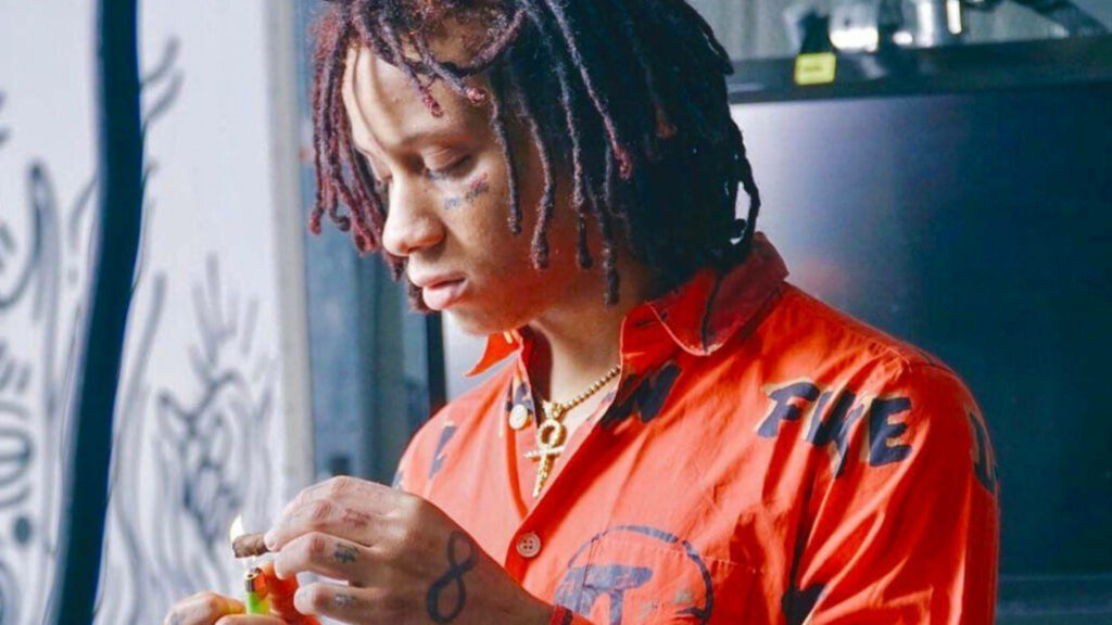 Smoke and Style: Trippie Redd's Red-Orange Polo Wallpaper