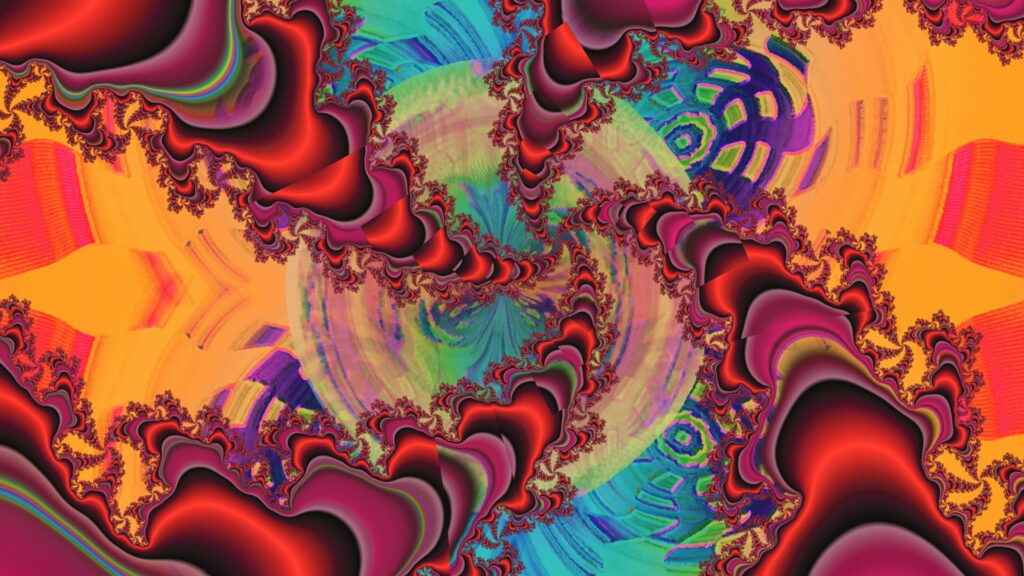 Vibrant fractal art wallpaper with swirling red magenta patterns on a colorful psychedelic backdrop
