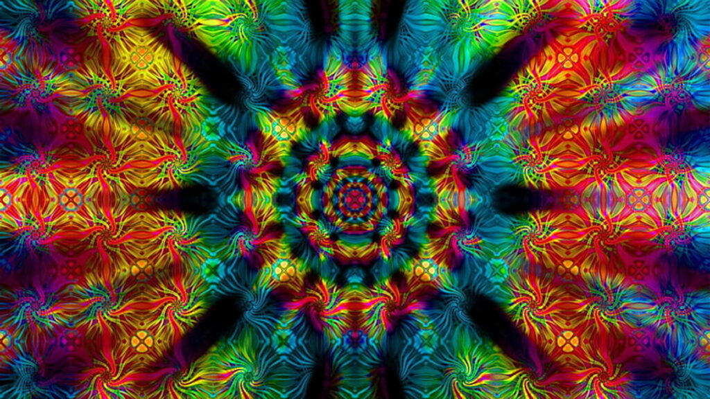 Vibrant psychedelic digital art with hypnotic radial patterns in electric blue magenta neon yellow Wallpaper