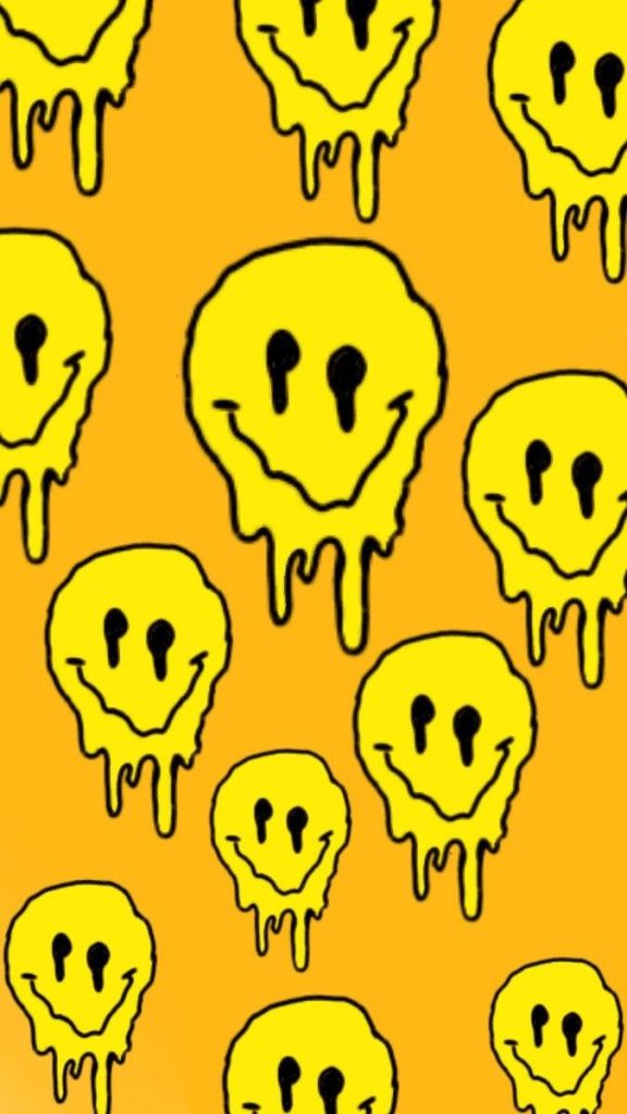 Yellow smiley face drip wallpaper with melting happy faces on vibrant orange background design