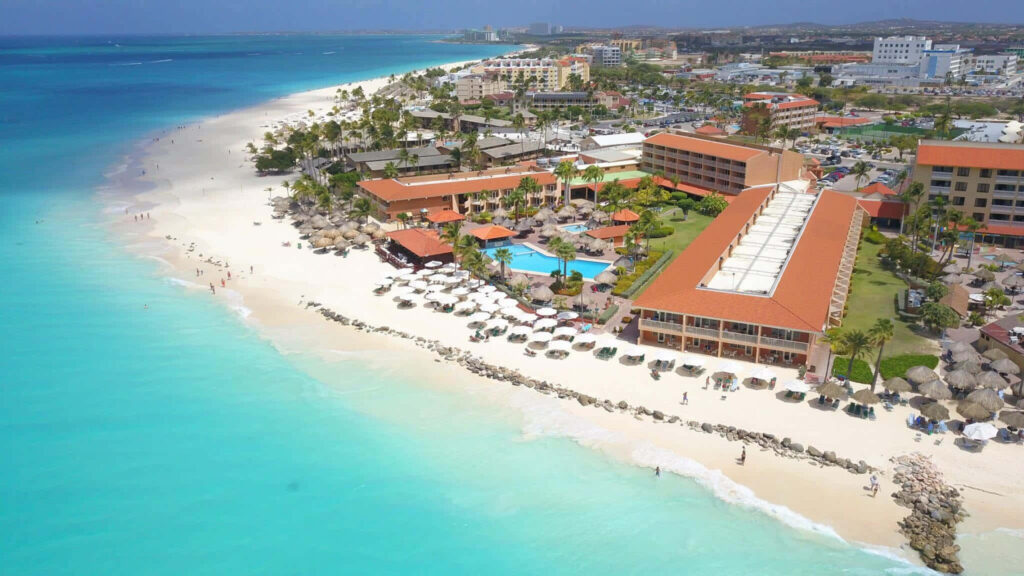 Stunning Aerial View of Aruba's Pristine Beach and Turquoise Waters Wallpaper