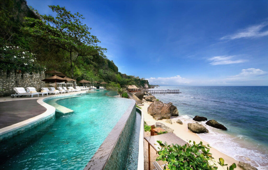Stunning Tropical Beach Wallpaper: Infinity Pool & Crystal Waters