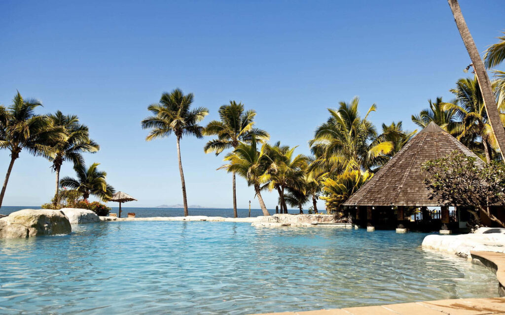 Tropical Beach Paradise Wallpaper: Serene Pools & Palm Trees