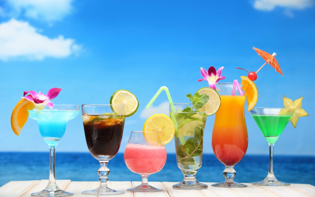 Sips of Paradise: Refreshing Tropical Libations by the Beach Wallpaper