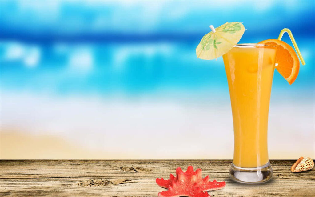 Tropical Orange Juice Wallpaper: Beach Scene with Parasol & Straw