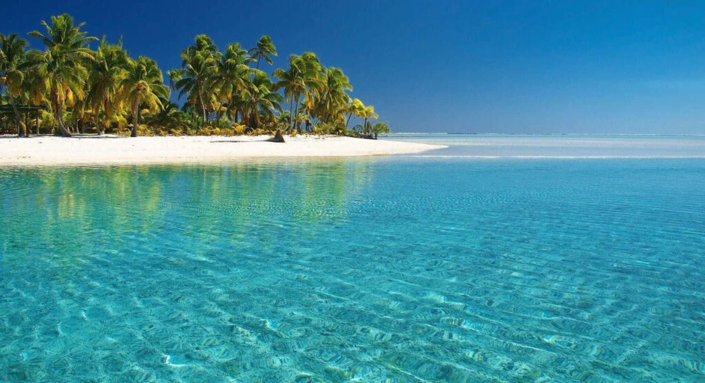 Azure Waters & White Sands: A Tropical Paradise Background Wallpaper