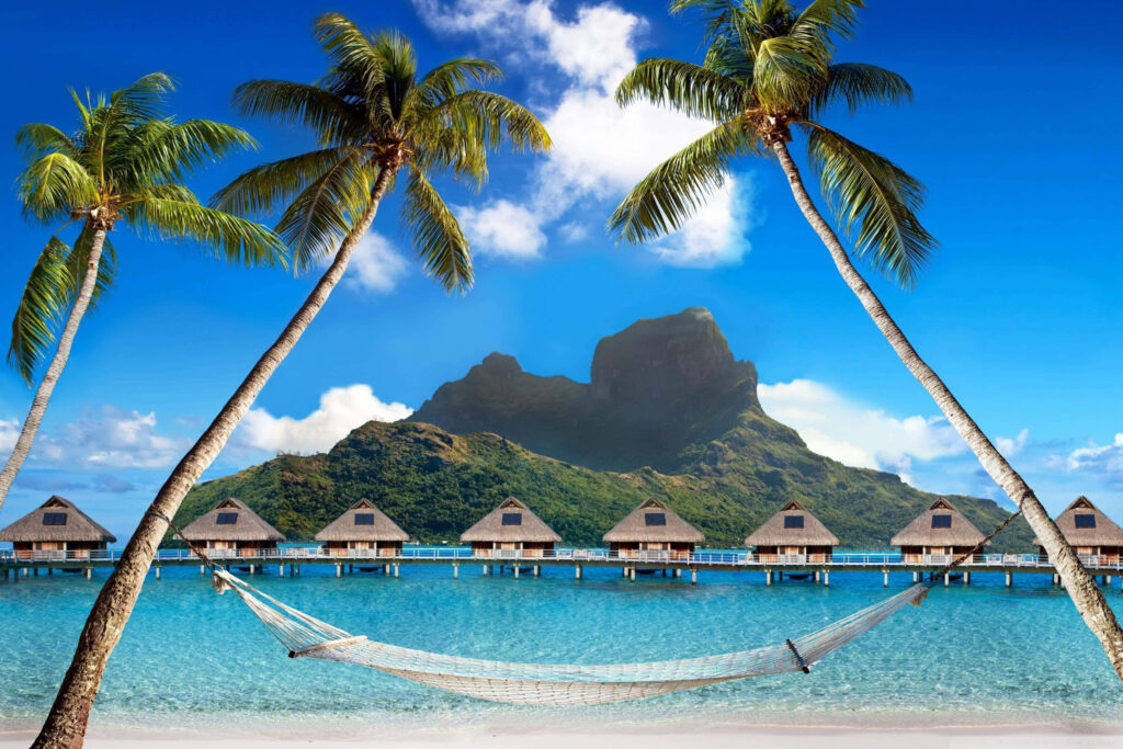 Serene Tropical Paradise Wallpaper: Hammock, Beach & Overwater Bungalows