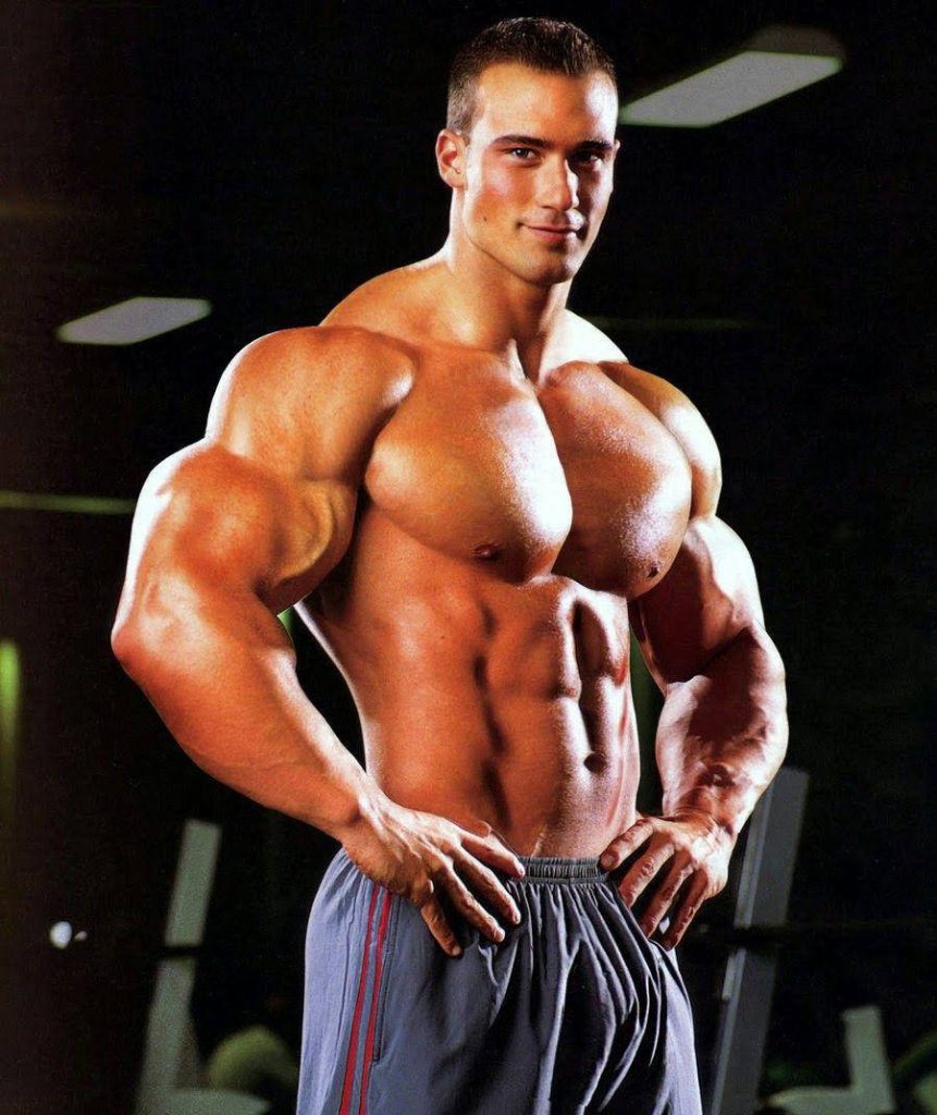 Professional bodybuilder Troy Alves intense muscle definition dark gym fitness wallpaper background