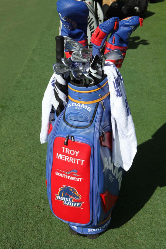 Vibrant Golf Bag with Troy Merritt, Boise State & Adams Golf Logos Wallpaper